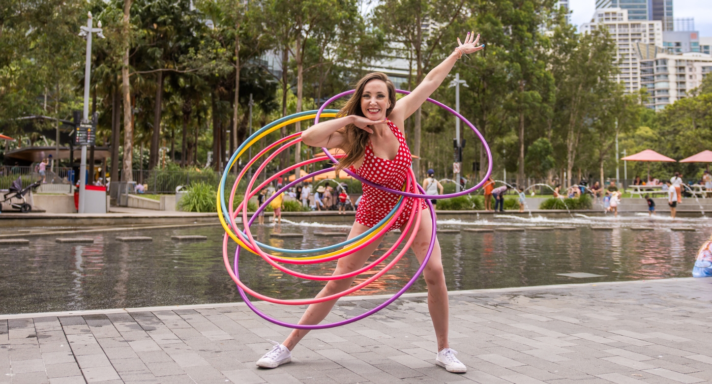 Woman with Hula Hoops at Darling Harbour
